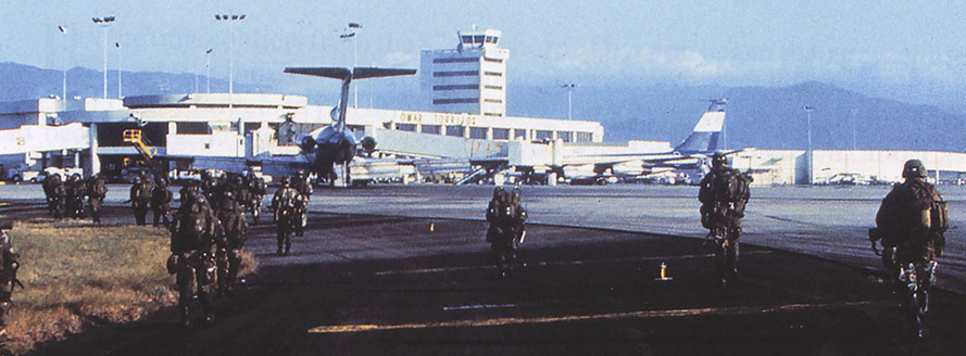 Soldiers move to their assigned locations at the airport, just after sunrise on 20 December 1989.