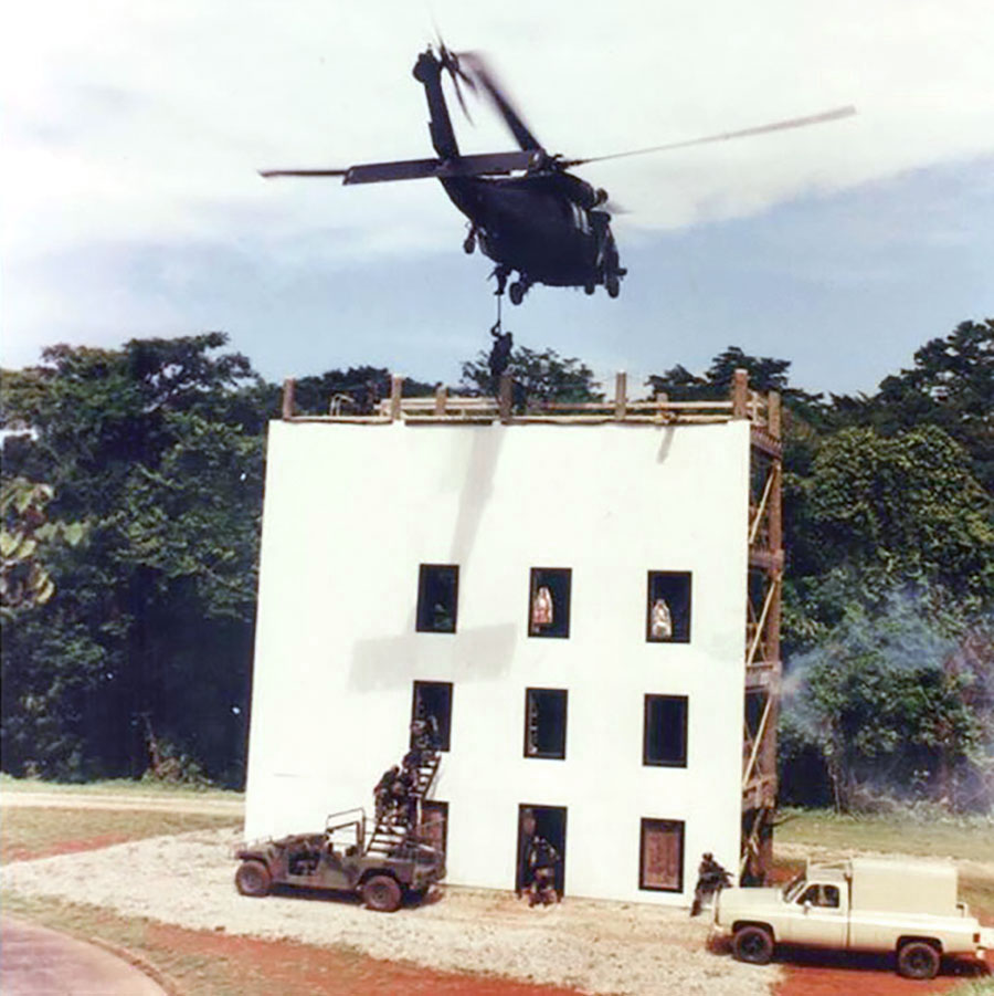 The 617th SOAD and Company C, 3-7th SFG demonstrate fast roping and insertion onto a multi-story building during the early-1990s. The units trained the same tactics in preparation for Operation JUST CAUSE.