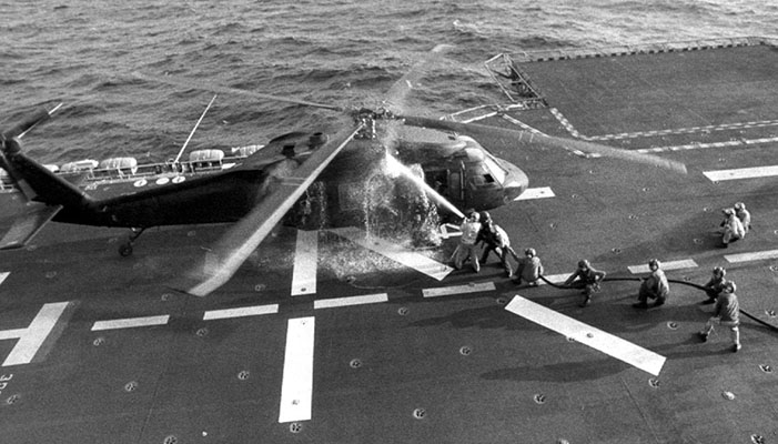 Following many recent deadly training accidents, Operation URGENT FURY in Grenada in late 1983 was the 160th’s ‘baptism by fire’.  The operation led to improved tactics, techniques, and procedures in SOA training and missions.  Here, a damaged UH-60 rests on the USS Guam after inserting SOF teams into combat on 25 October.