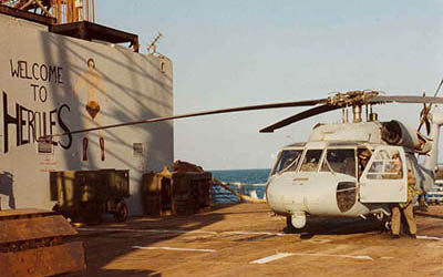 While supporting Operation EARNEST WILL, CPT Mark A. Olinger, 528th SOSB, accompanied 160th Special Operations Aviation Group air crews on resupply missions to U.S. Navy frigates throughout the Arabian Gulf, and to the mobile sea barge Hercules, pictured here.