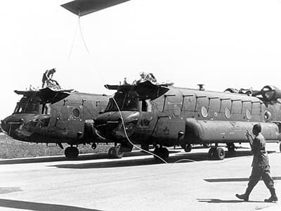 The two Chinooks have been disassembled prior to loading on a C-50 Galaxy. Both pylons and rotors had to be removed on each aircraft, to allow them to fit into the cargo bay.