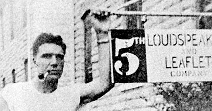 John W. Sanders beside the company sign, Fort Riley, Kansas, 1951.