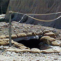 Two types of underground bunkers provided soldiers with protection from indirect fire.  These were located near sleeping areas and work stations for use during rocket or mortar attacks. The troops regularly rehearsed emergency actions.