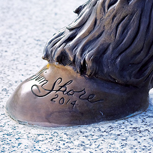 Jim Shore signature inscribed on centaur hoof.