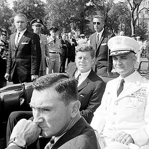 JFK and Westmoreland in the presidential limo for the short trip to Gillis Field House for the graduation ceremony.