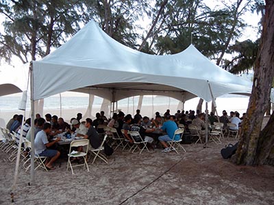 At the luau, each group presented tokens to the participating soldiers, including certificates and a jump wing exchange.