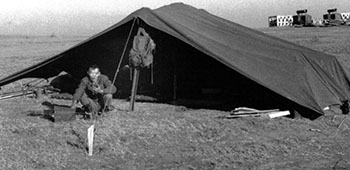 Tent for the ARVN guards. A squad of ARVN guarded the entrance to the station. Internal security was provided by the PSYOP soldiers. In the right rear of the photo are the generator sets.