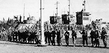 The Rangers of 3rd Battalion preparing to load landing craft for the amphibious landings in Sicily.