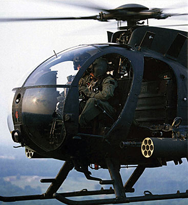 AH-6 “Little Bird” with rocket pods and miniguns.