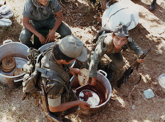 Tortillas served as the soldiers’ plates for beans and rice, the staples of the Salvadoran diet, whether in the cuartel messhall or in the field. ODA-7 soldiers ate the same thing, but were served on plates in the messhall.
