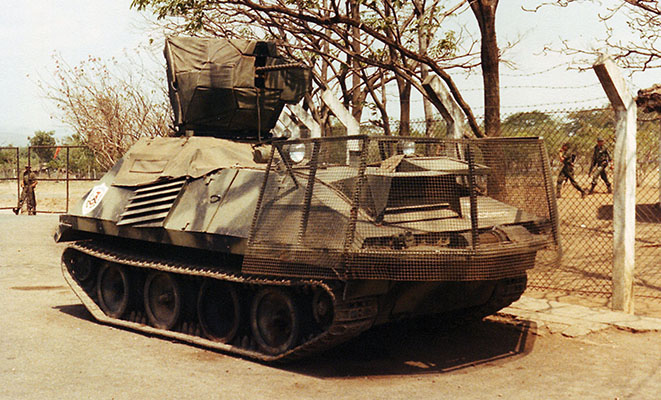 The homemade mini-armored vehicle was a “bullet magnet,” that valiantly charged into the mouth of the FMLN, fired once, and beat a ha sty, ignoble retreat to safety.