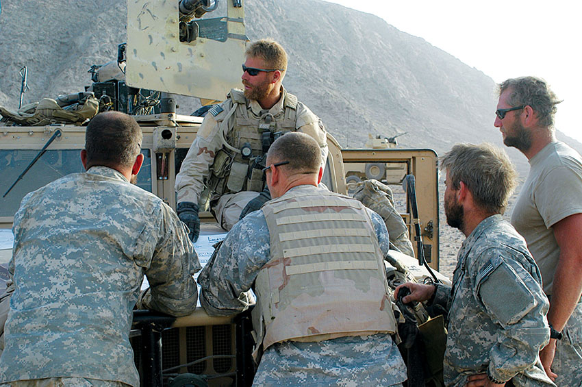 MAJ Jamie Hall* AOB-330 commander, briefs his men prior to commencing operations in the Panjwayi.