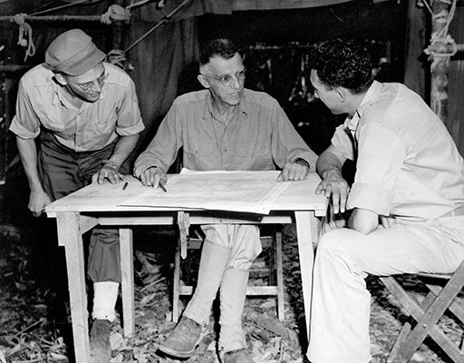 LTG Joseph W. Stilwell, Commanding General of the Northern Combat Area Command, consults with LTC William R. Peers in Burma, Commanding Officer of OSS Detachment 101.