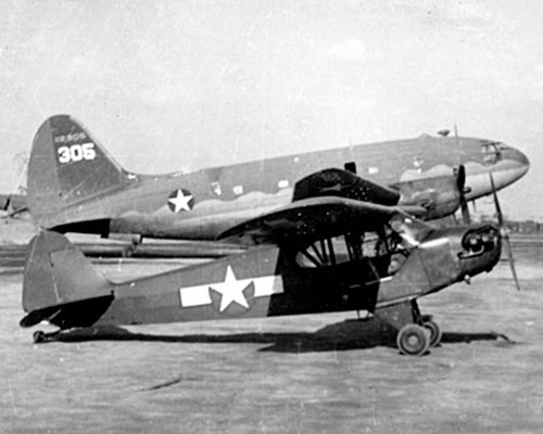 The C-46 Commando (in background) had more power and carrying capacity than a C-47, but was not as easy to fly or as dependable. In front of the C-46 is a Piper Cub, in Army nomenclature, the L-4 Grasshopper, which was used for liaison and observation.