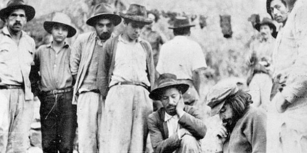 Che Guevara examines a map in Citanos in an attempt to gain intelligence about the Bolivian Army in the area. At this stage of the foco’s campaign the peasants probably reported the guerrillas presence as soon as they left the village.