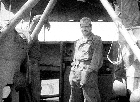 1LT Walter L. Mess on the bridge of P-564.