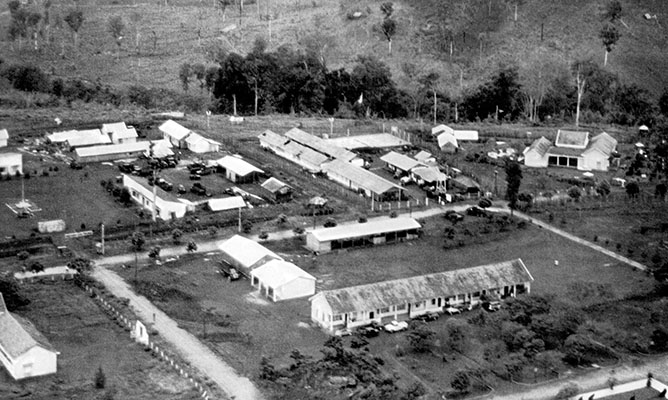 The Special Forces camp at Song Be came under heavy attack from the Viet Cong, who assaulted from the woods in the upper right. The VC offensive against the SF camps led to the formation of the MIKE Force.