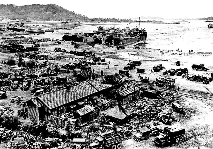 Four LSTs unload on Inch'on’s Red Beach, 16 Sep 1950, the day after initial landings.