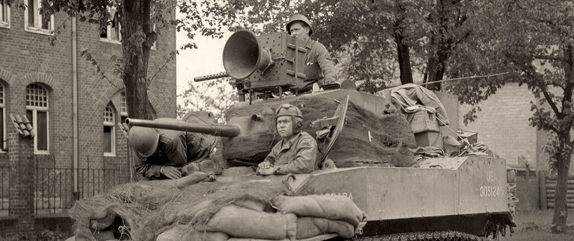 A common set-up of tactical Psywar units in Europe during WWII, a loudspeaker system is mounted on an M5A1 Light Tank, along with the 37 mm main gun and three .30 cal machine guns.