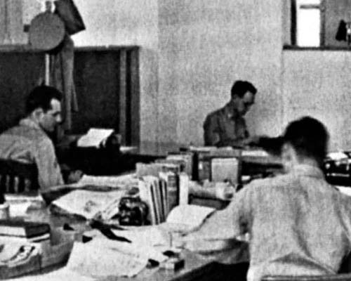 Radio script writers at work in the Empire House, 1951.