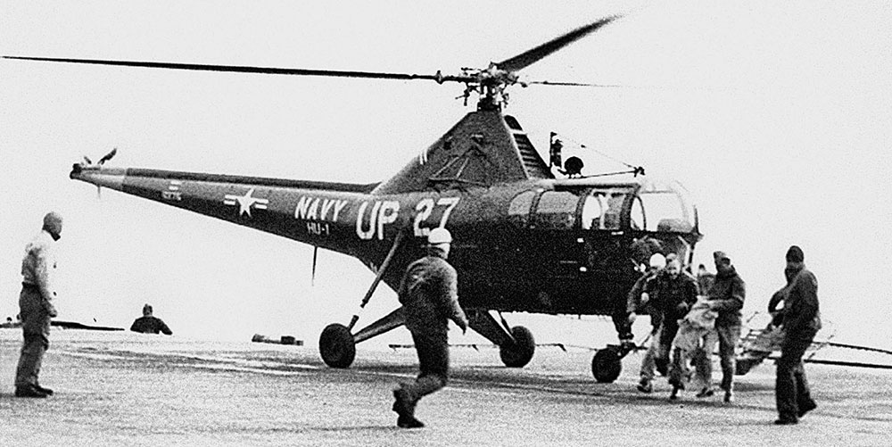 U.S. Navy Sikorsky HO3S-1 from Helicopter Utility Squadron 1 landing on the carrier USS Philippine Sea (CV-47) after rescuing a downed pilot in 1951.