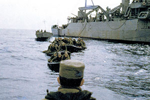 USMC MAJ Vincent R. ‘Dutch’ Kramer, center foreground observes the practice tow of the RB-10s.