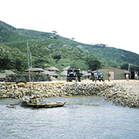 Supplies off-loaded into U.S. Army trucks