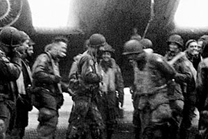 Men of the Second Regiment on Amchitka wait beneath their C-47 aircraft. The Second Regiment was the Force reserve and was prepared to conduct a parachute assault onto Kiska to reinforce the invasion.