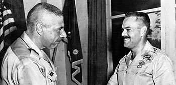 In 1963, First Lieutenant Fry returned to Special Forces and was assigned to the 8th Special Forces Group in the Panama Canal Zone. Here, the Group Commander, Colonel Arthur D. ‘Bull’ Simons, presents the Army Commendation Medal to Fry for his previous service with the Airborne Department. Simons became a valued mentor during his career. 