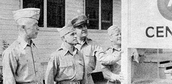 COL Charles H. Karlstad, COL Aaron Bank, LTC Lester Holmes and COL John O. Weaver in front of the Psywar Center. 