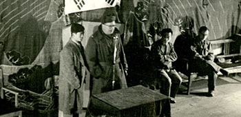Colonel Munske speaking to boys and girls at the Prize Eloquence Contest on 16 Dec., 1951, under the auspices Korea Juvenile Campaigners' League