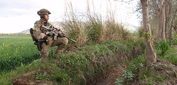 Sgt. Maj. Payne pulling security while in Afghanistan in 2010.