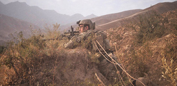 Sgt. Maj. Payne in Northern Afghanistan in 2014. Payne and his unit had been ambushed on this same hill the day prior.