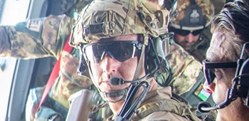 Sgt. Maj. Payne flying by helicopter in Afghanistan in 2019.