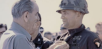 Col. Puckett receiving his second Distinguished Service Cross from President Lyndon B. Johnson “To the family of Col. Ralph Puckett Jr. – Who distinguished himself in very exceptional service to his country – a proud son of Georgia – a great national patriot.”