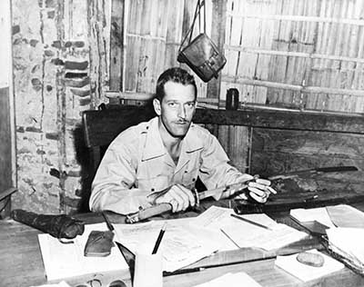 1945: Holding sword owned by General Osaki, commander of the 19th Tora Division